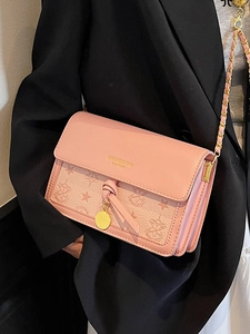 Elegant pink crossbody bag with litchi texture and gold chain for women's daily commute