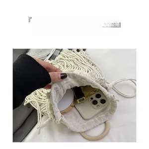 Internal view of handmade cotton woven bag with wooden handles and large storage capacity