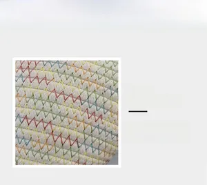 Detailed macro view of woven cotton cord texture with colorful zigzag stitching pattern