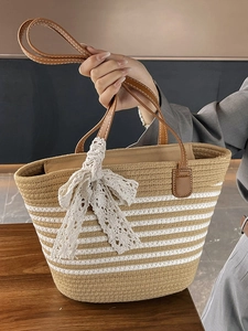 Handwoven large capacity tote bag with brown stripes and cream lace bow accent