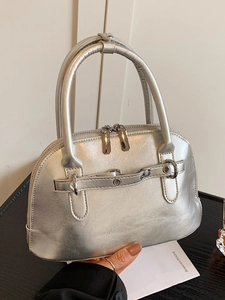 Chic silver metallic shell handbag with double handles and sleek zip closure for women