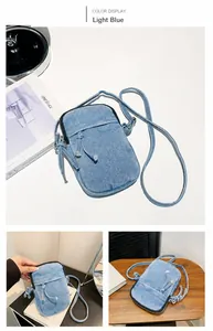 Detail of light blue washed denim mini crossbody bag with drawstring and zip closure