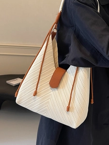 Fashionable minimalist woven tote bag with rope strap and chic brown contrast trim