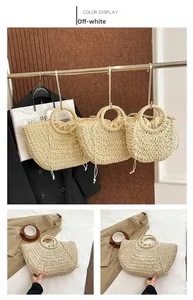 Detail showing the beige straw basket bag with circular handles and drawstring lining
