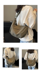 Detail of adjustable strap and woven puller on large army green nylon hobo bag