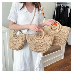 Three sizes of handmade straw basket bags with drawstring lining and round handles