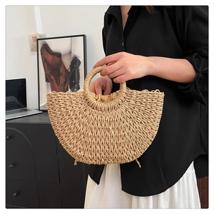 Detailed macro view of the woven straw texture and protective inner drawstring lining