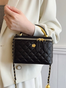 Elegant quilted black box bag with golden camellia logo and chain strap for women