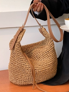 Minimalist straw tote bag with brown leather strap and large capacity for women