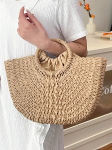 Minimalist straw hand-woven basket bag with drawstring inner pouch for beach travel