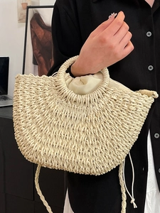 Chic woven straw handbag with inner drawstring bag for beach vacation style