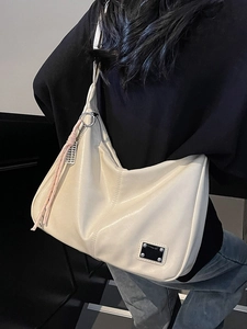 Off-white vintage large capacity hobo bag with pink tassel and silver hardware