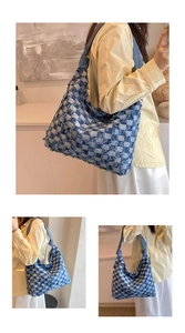 Detail of blue and white checkered denim tote bag featuring vintage frayed edges