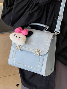 Light blue chic small square bag with star studs and pearl trim with plush charm