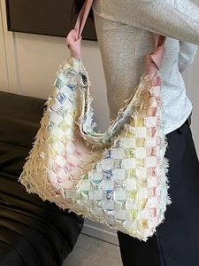 Rainbow checkered woven tote bag with fringe details and pink leather knot straps