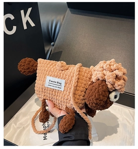 Detailed knit texture of a sheep-shaped crochet crossbody bag with Faerie Bag label