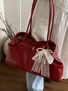 Glossy dark red leather tote bag with elegant pearl lace bow accessory and large capacity