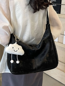 Elegant black hobo tote bag in oily leather finish with a cute cloud pendant accessory