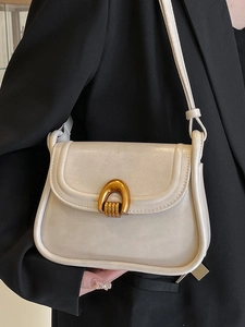 French retro saddle bag in cream white leather with gold horseshoe lock for women