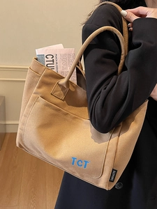 Japanese style khaki canvas tote bag with large capacity for commuting and daily school use