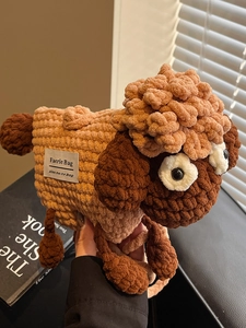 Handmade crochet sheep crossbody bag in khaki and brown yarn with big eyes detail