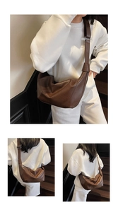 Detail view of large brown hobo crossbody bag in soft vintage leather for daily commuting