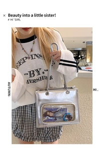 Silver PU leather ita bag featuring a transparent display window for anime badges