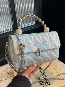 Holographic quilted crossbody bag with pearl handle and silver chain strap