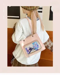 Pink ita-bag with large transparent display window and sleek oil-wax leather finish