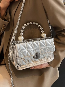 Silver metallic quilted handbag with pearl beaded handle and silver chain strap