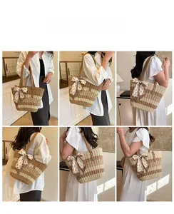 Detail of color-block straw tote bag with floral scarf and brown leather shoulder straps