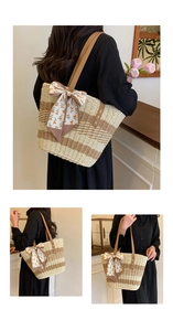 Detail of summer straw tote bag with brown PU straps and floral bow scarf decoration