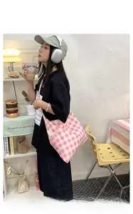 Pink and white gingham canvas tote bag with a spacious interior for student daily commute