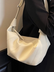 Chic beige large capacity leather tote bag with elegant pleated stitching for women