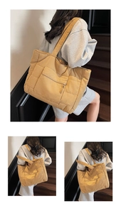 Détail du sac cabas matelassé camel avec coutures carrées et poche avant zippée