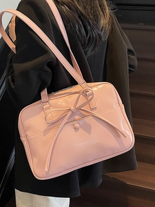 Pink glossy patent leather balletcore tote bag with large bow and crossbody strap