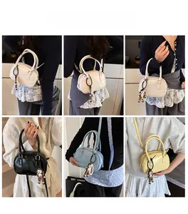 Versatile mini bowling bag in four colors shown with crossbody and handbag styling options
