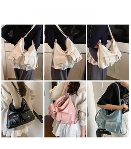 Versatile large capacity Hobo tote bag shown in white, black, pink and blue colors