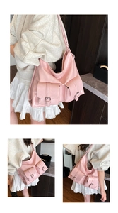 Detailed views of pink large tote bag with metallic buckles and adjustable shoulder straps
