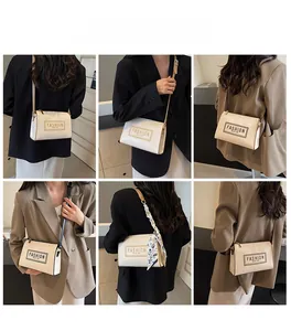 Detailed views of a beige crossbody bag with fashion embroidery and decorative silk scarf