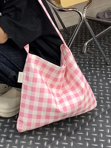 Minimalist pink and white checkered canvas tote bag with side label for daily casual wear