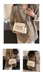 Close-up of contrast color crossbody bag with cream beige PU leather and fashion text