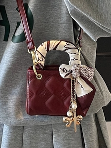 Elegant wine red mini quilted handbag with silk scarf handle and pearl butterfly charm