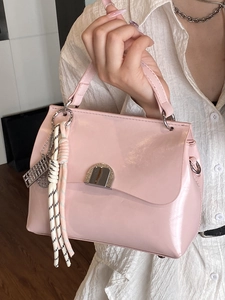 Pink glossy PU leather tote bag with silver buckle and woven tassel for daily fashion