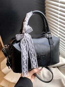 Glossy black PU leather pillow bag with letter embossing and elegant lace ribbon decoration