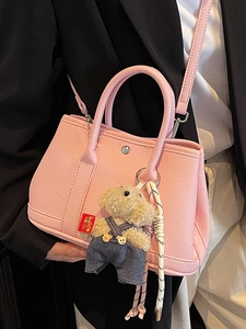 Sac seau en cuir grainé rose avec charm ours mignon pour le style quotidien