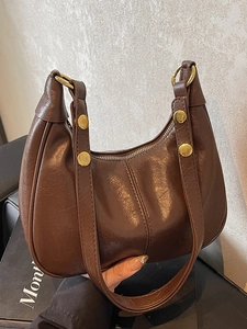 Retro brown crescent shoulder bag in oil-wax faux leather with golden rivets