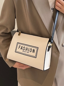 Cream rectangular crossbody bag with black strap and fashion enjoy art text print