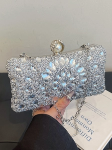 Luxury silver rhinestone evening clutch bag with crystal accents and pearl clasp for women
