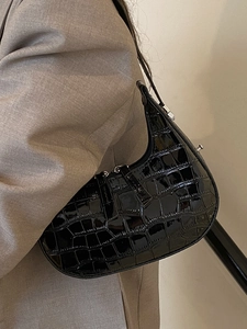 Chic black crocodile pattern hobo bag with glossy finish and moon shape design